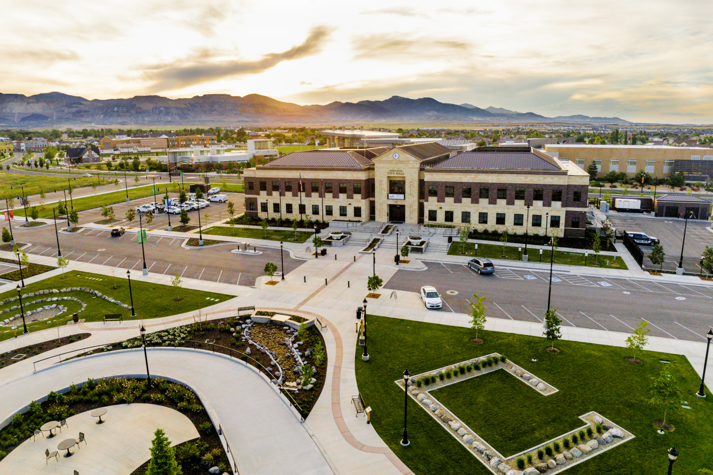 An aerial image of the Herriman City Hall around sunset
